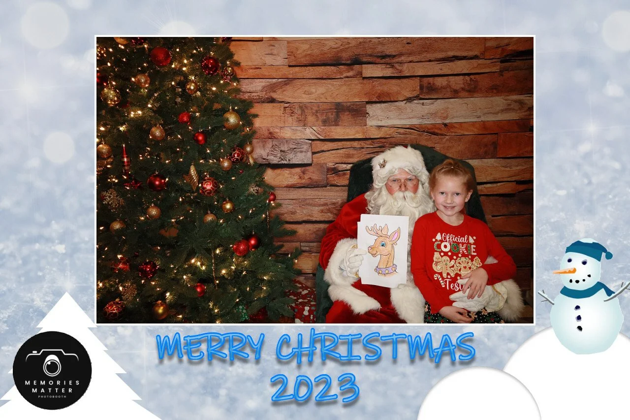 Smiling guests with Santa at a community holiday event